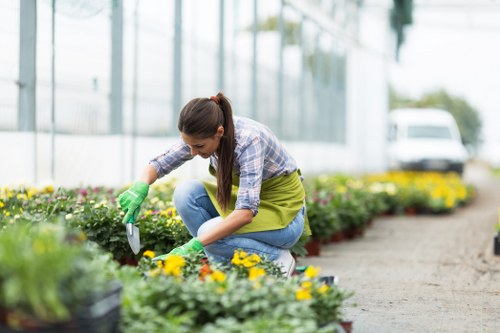 Operative reviewing a lawn area during inspection